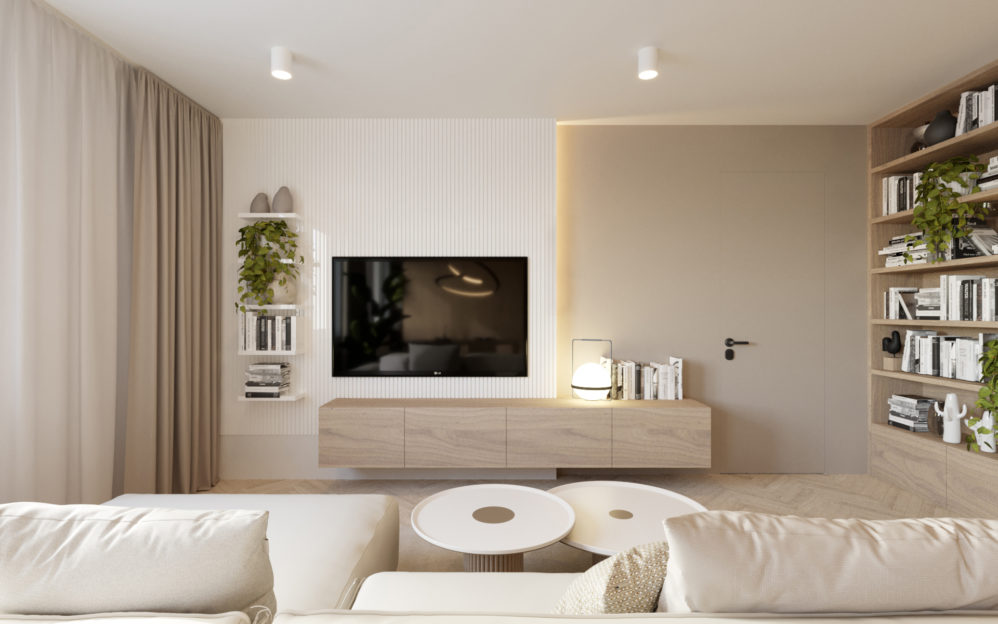 Interiér obývacího pokoje s kuchyní v bytovém domě v Libni